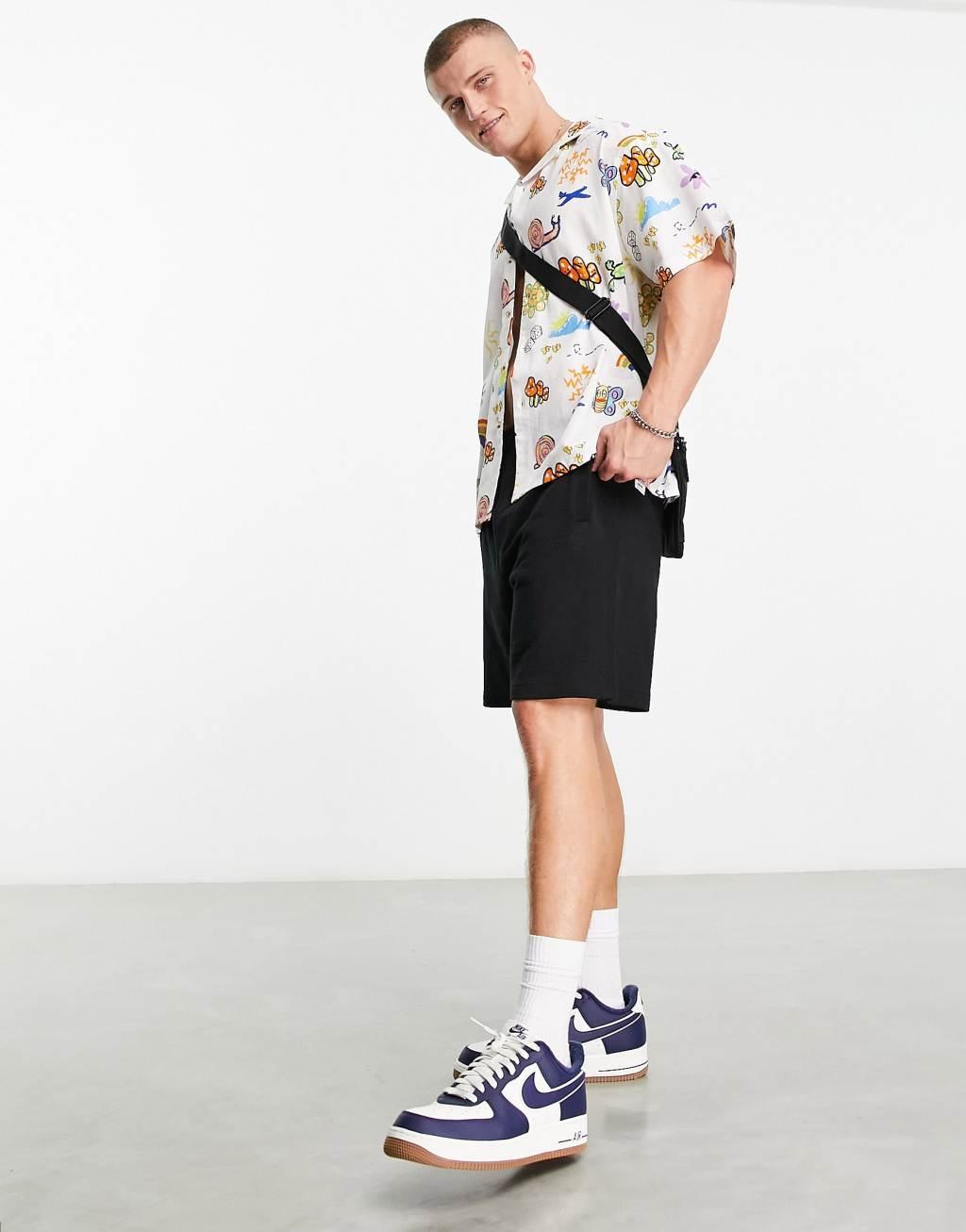 ASOS DESIGN boxy oversized revere linen mix shirt in doodle print Product Image