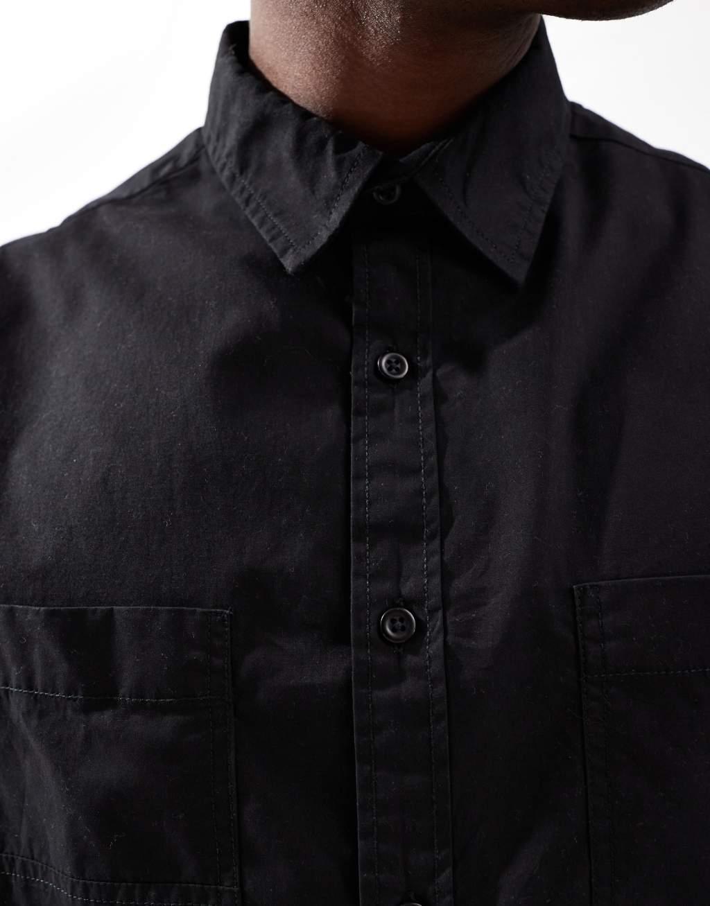 ASOS DESIGN boxy shirt with square pockets in black Product Image