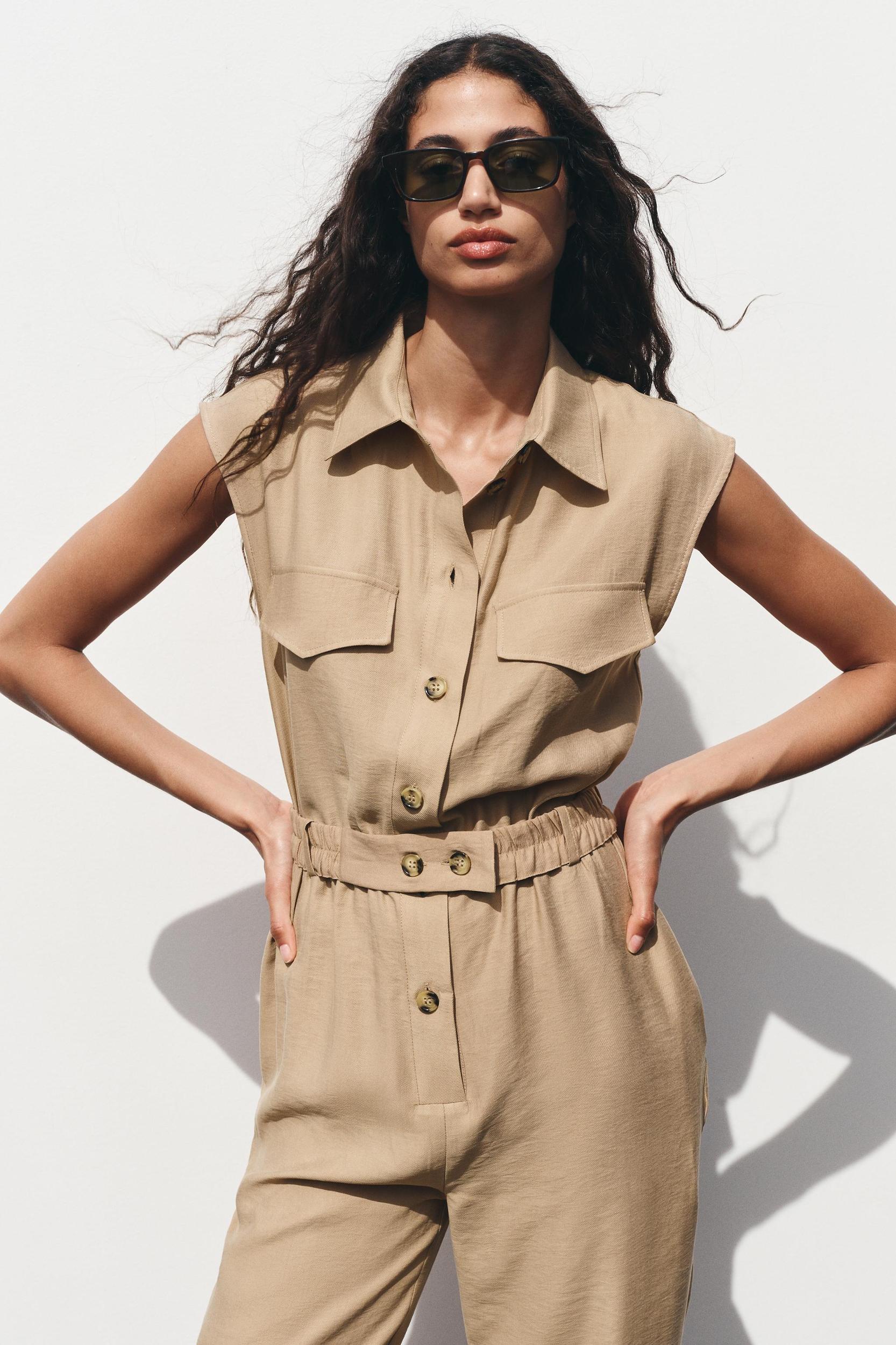 SLEEVELESS BELTED JUMPSUIT Product Image