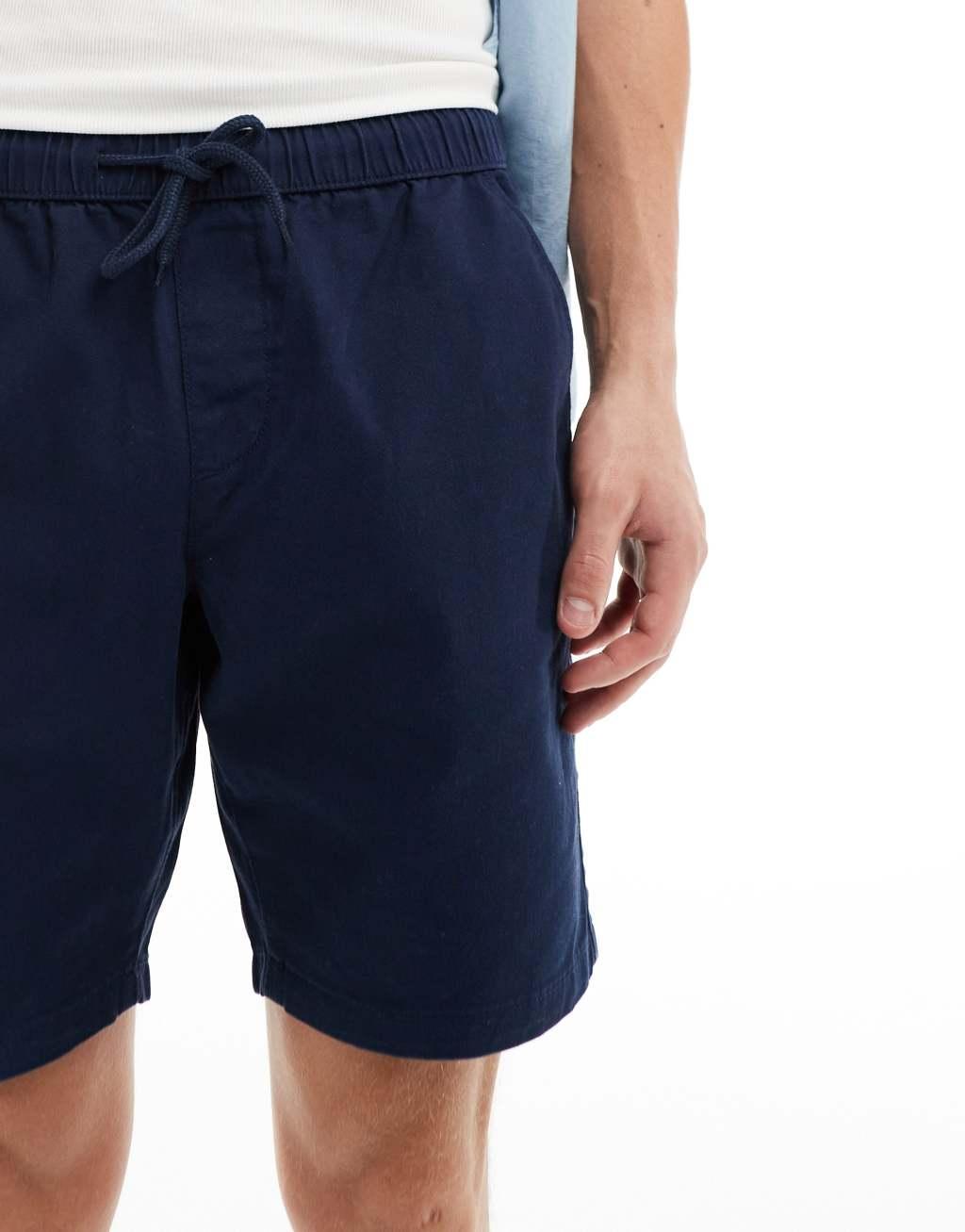 ASOS DESIGN slim chino shorts in navy Product Image