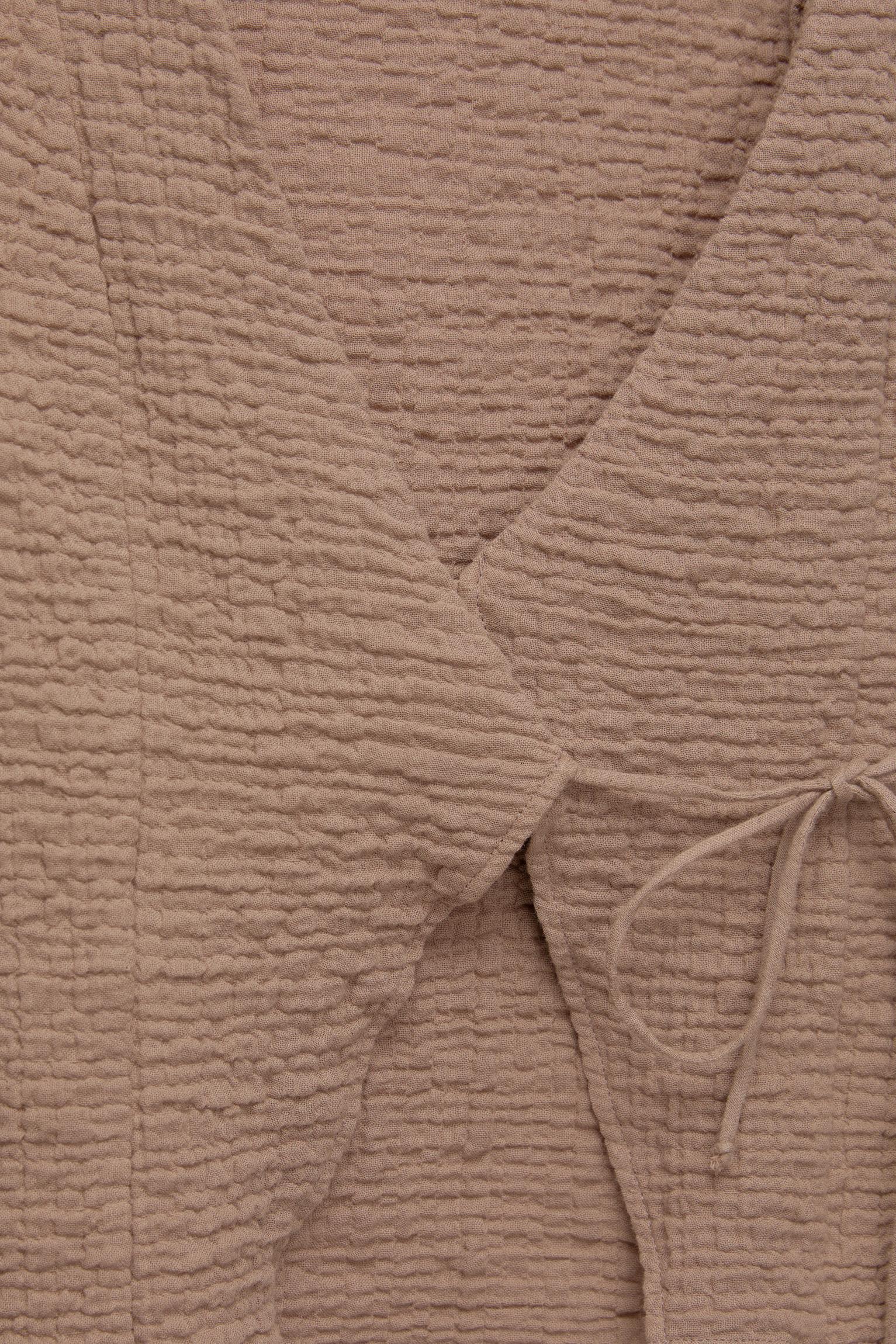 Rustic creased-effect top Product Image