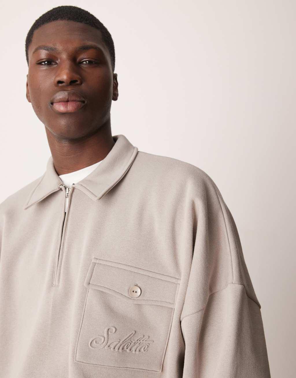 ASOS DESIGN oversized boxy polo sweater with embroidered pocket in latte Product Image