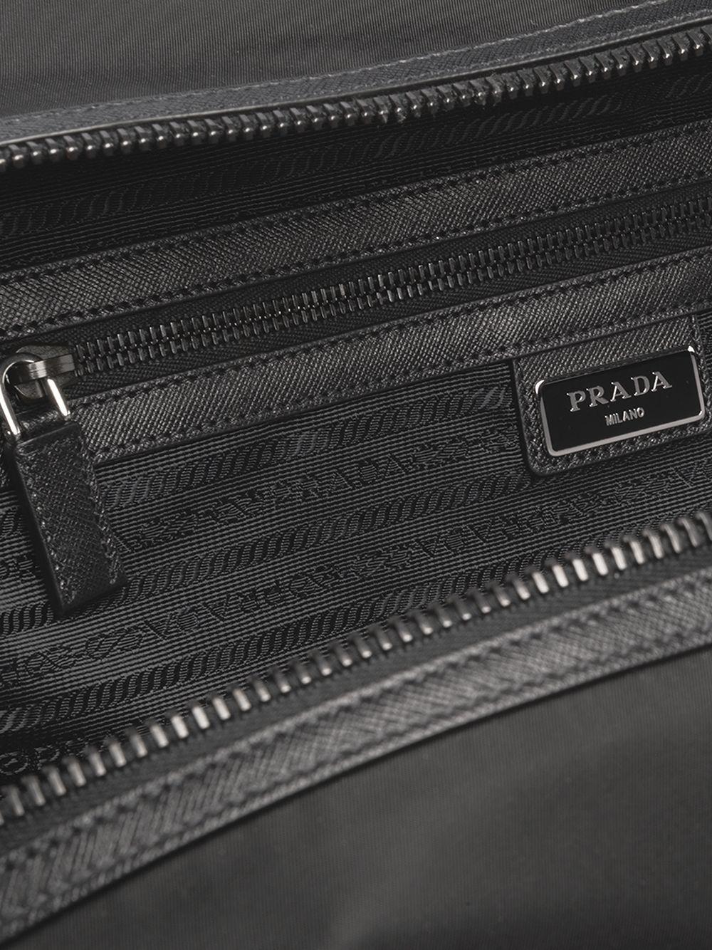 Re-Nylon triangle logo holdall bag Product Image