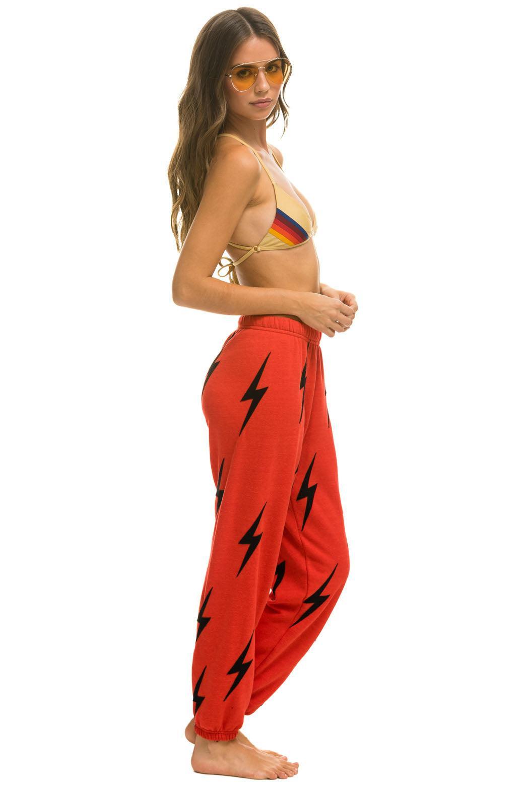 BOLT STITCH REPEAT SWEATPANTS - RED // BLACK Female Product Image