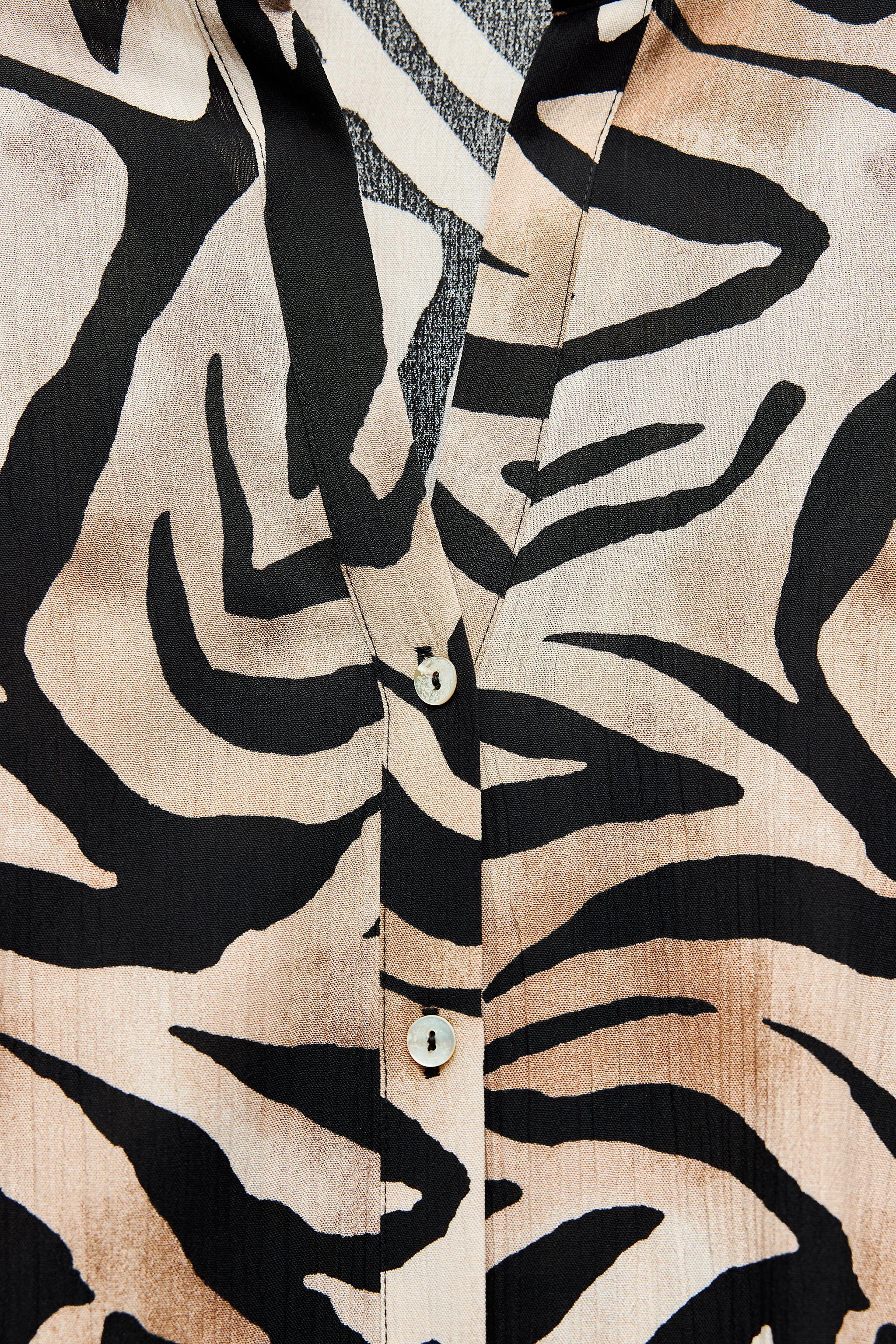 WIDE LEG ANIMAL PRINT PANTS Product Image