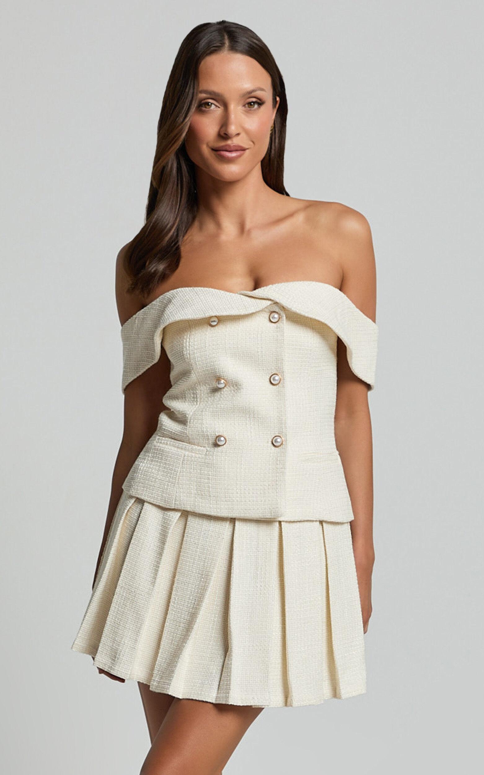 Maggie Mini Skirt - Pleated Mid Rise Boucle Skirt in Cream Product Image