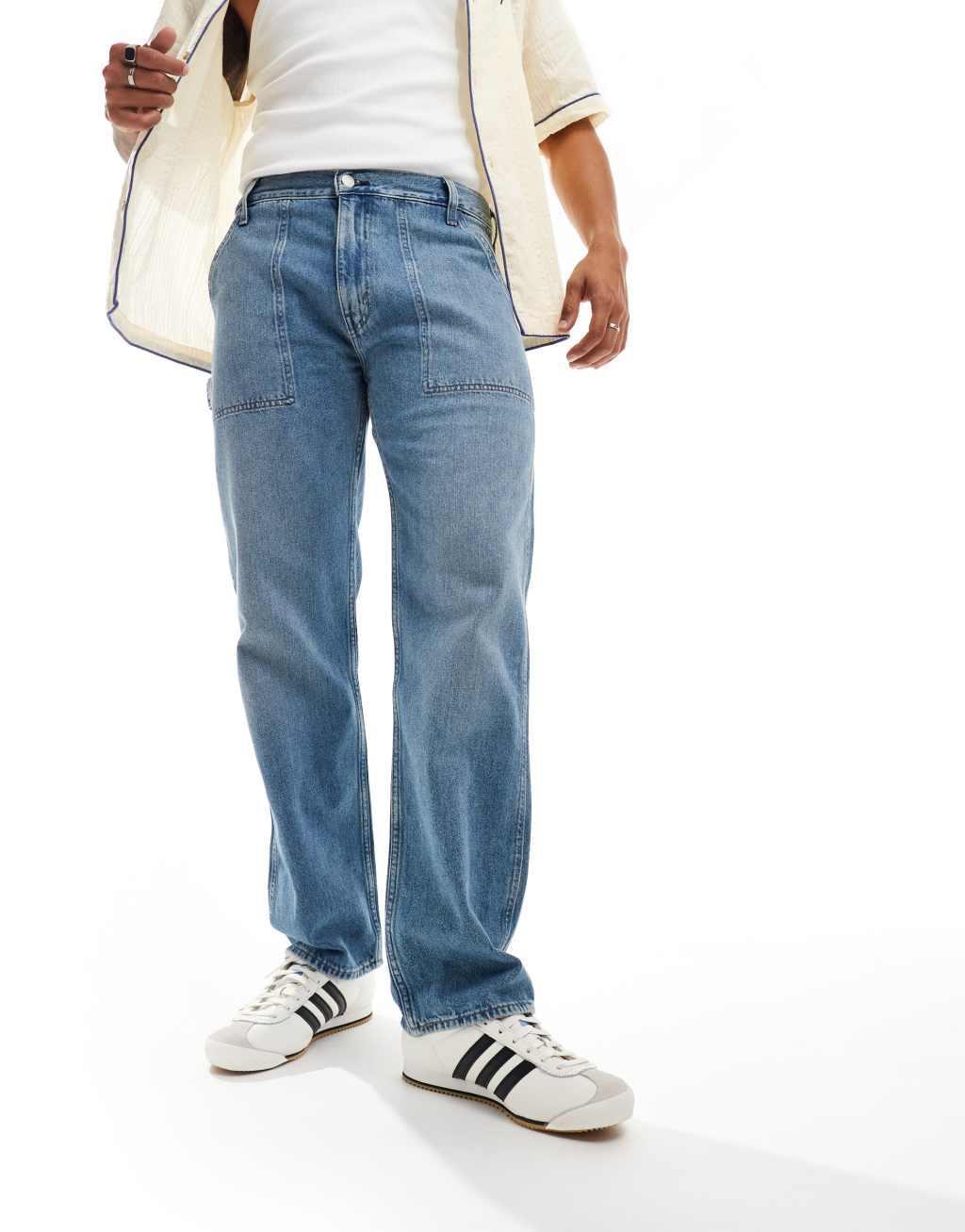 Levi's 555 relaxed straight utility jeans in mid blue Product Image
