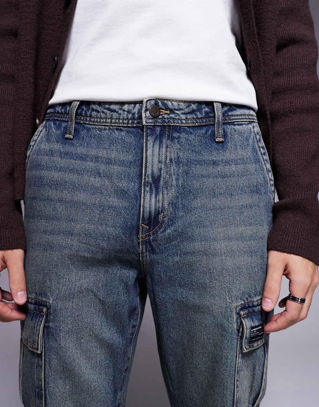 ASOS DESIGN straight leg jeans with cargo detail in mid wash blue Product Image