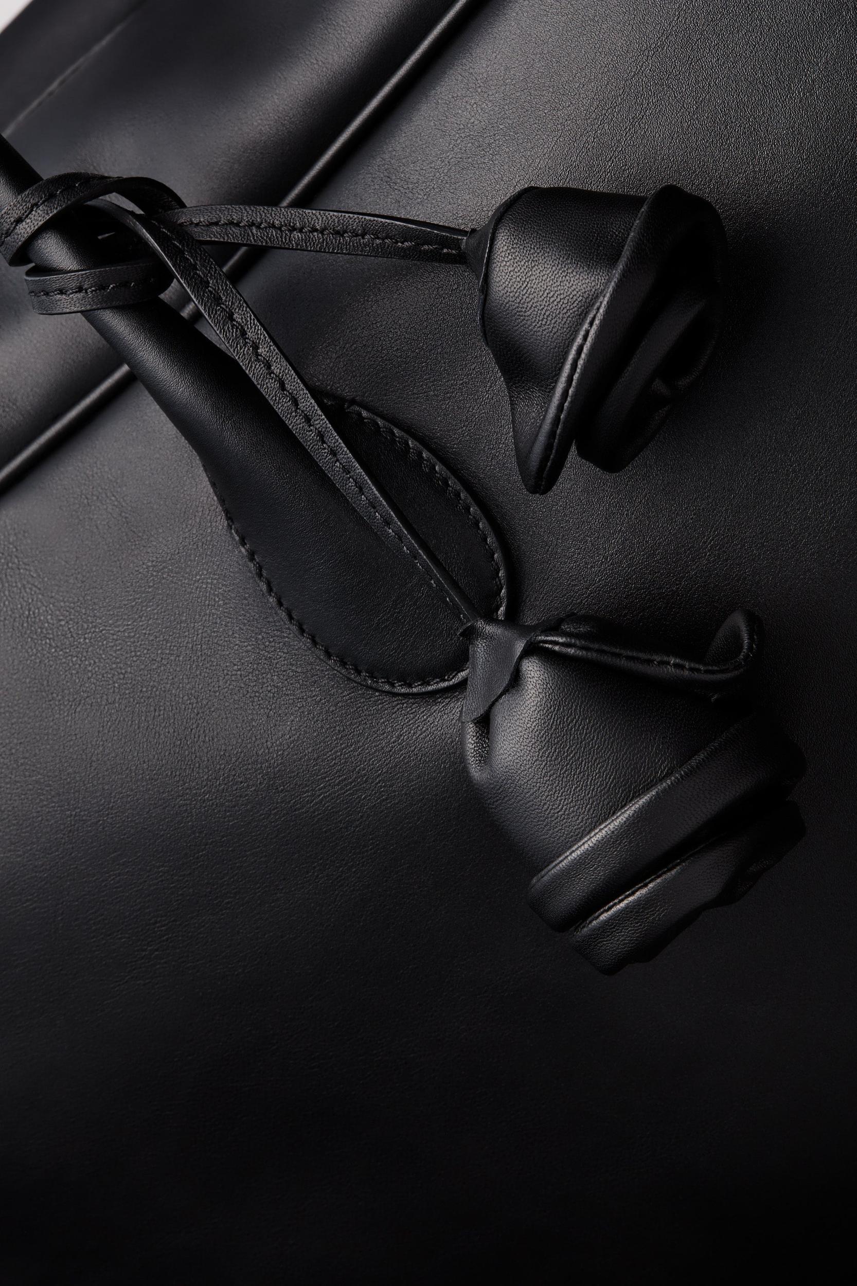 Travel Brigitte bag in black leather Product Image