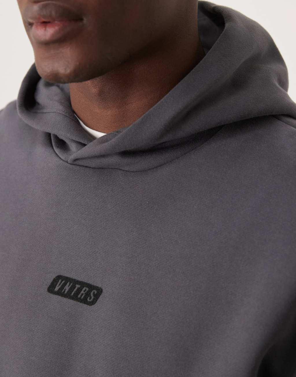 ASOS DESIGN premium heavyweight boxy oversized hoodie with chest print in washed black Product Image