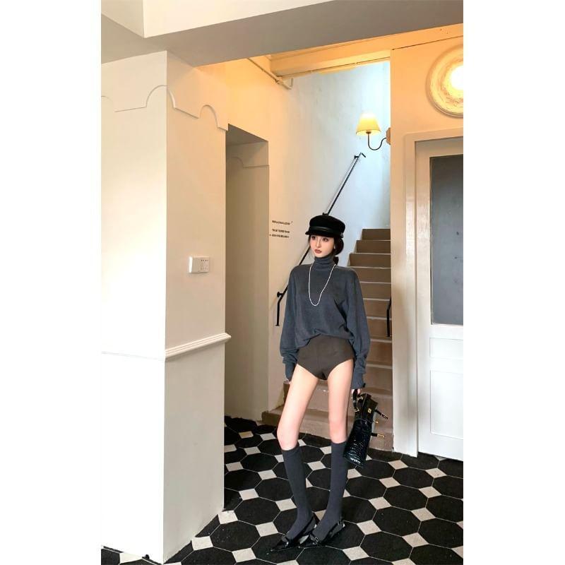 Long-Sleeve Turtleneck Plain Open Back Knit Top / High Waist Hot Pants Product Image