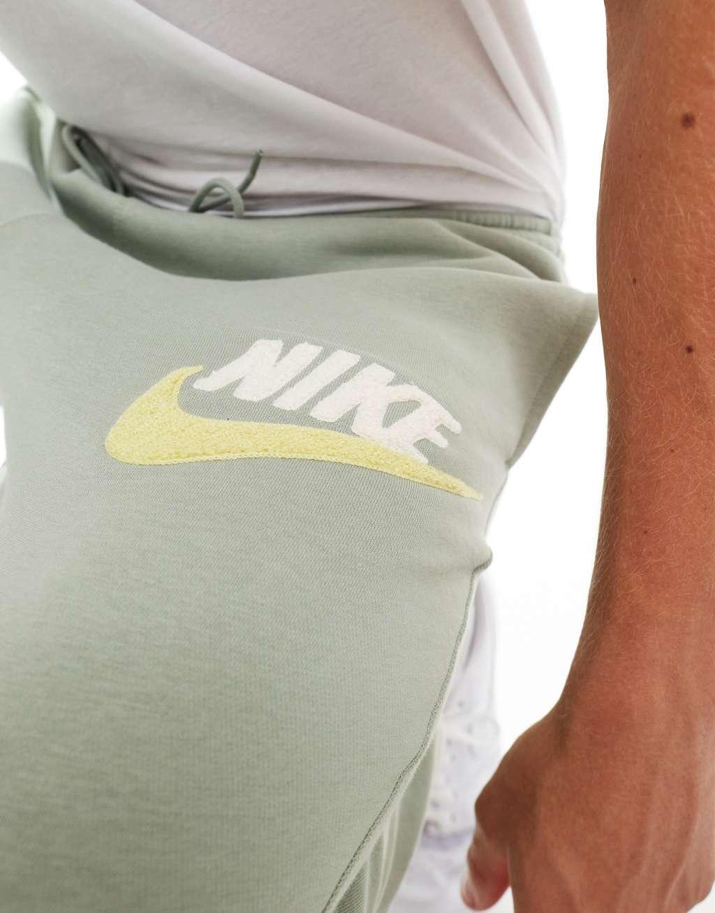 Nike Club Chenile Futura logo sweatpants in khaki Product Image