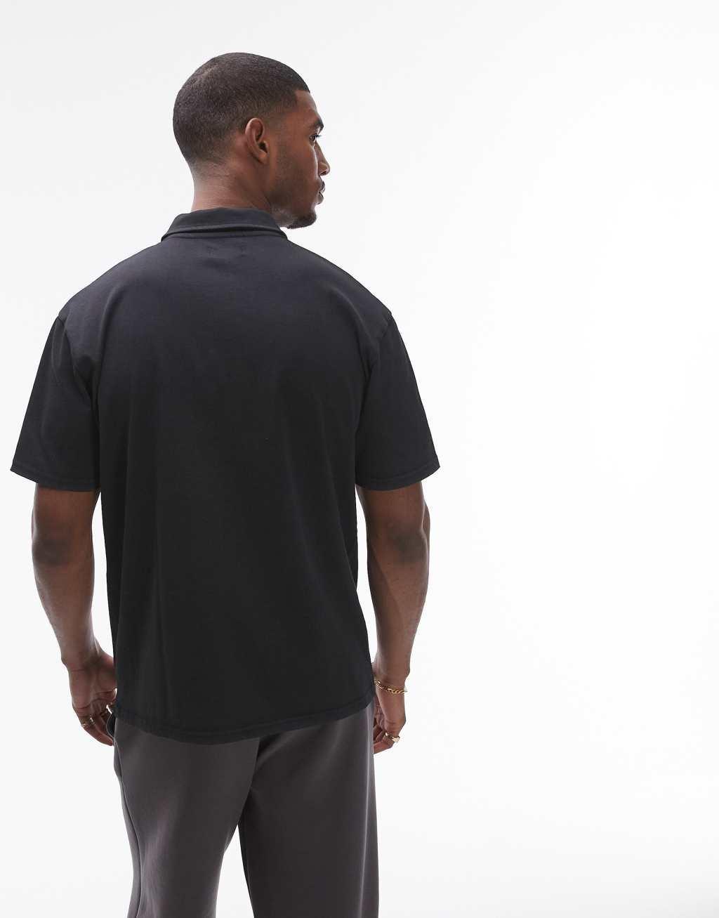 Topman oversized fit polo in washed black Product Image