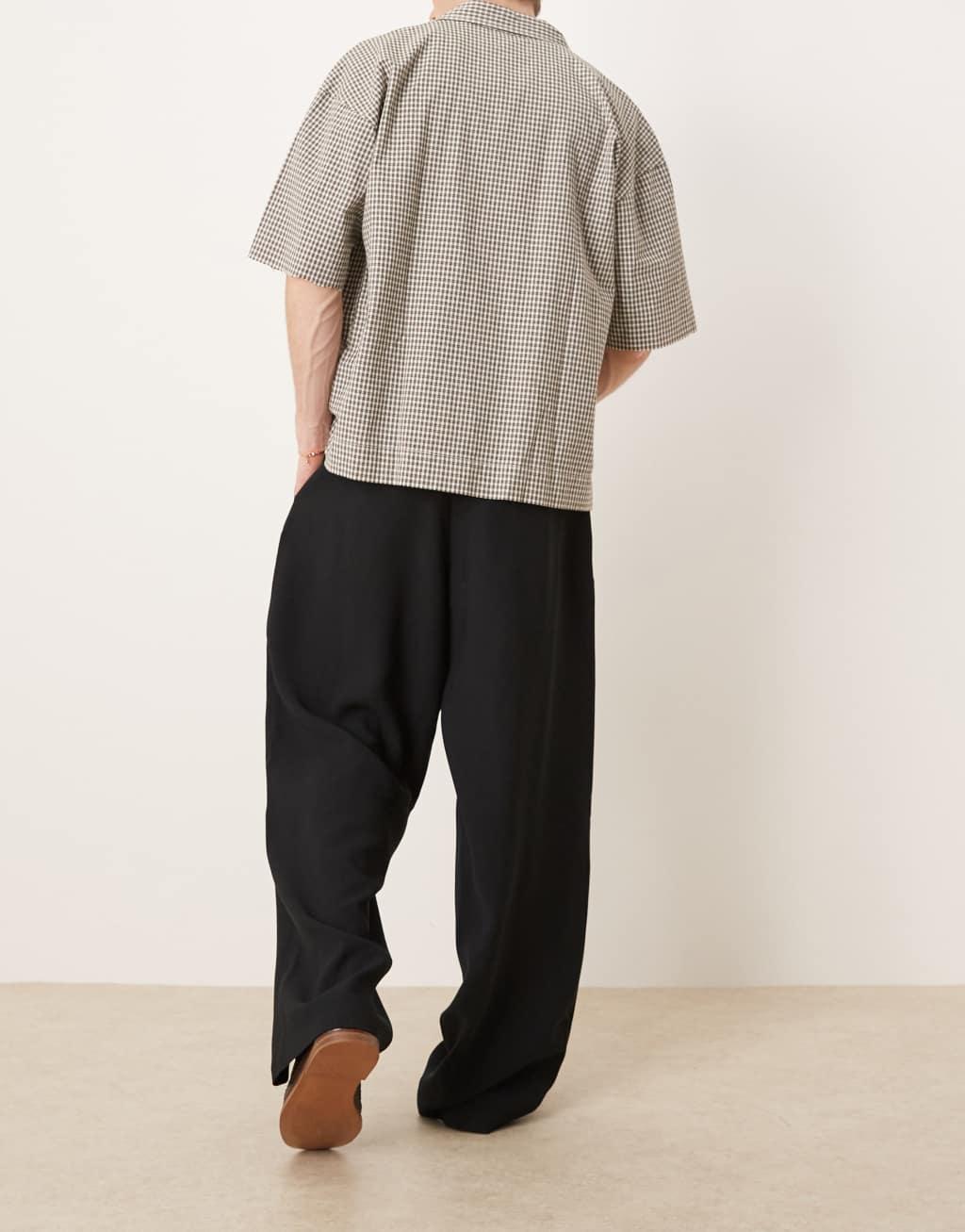 ASOS DESIGN wide leg smart pants with front pleat in black Product Image