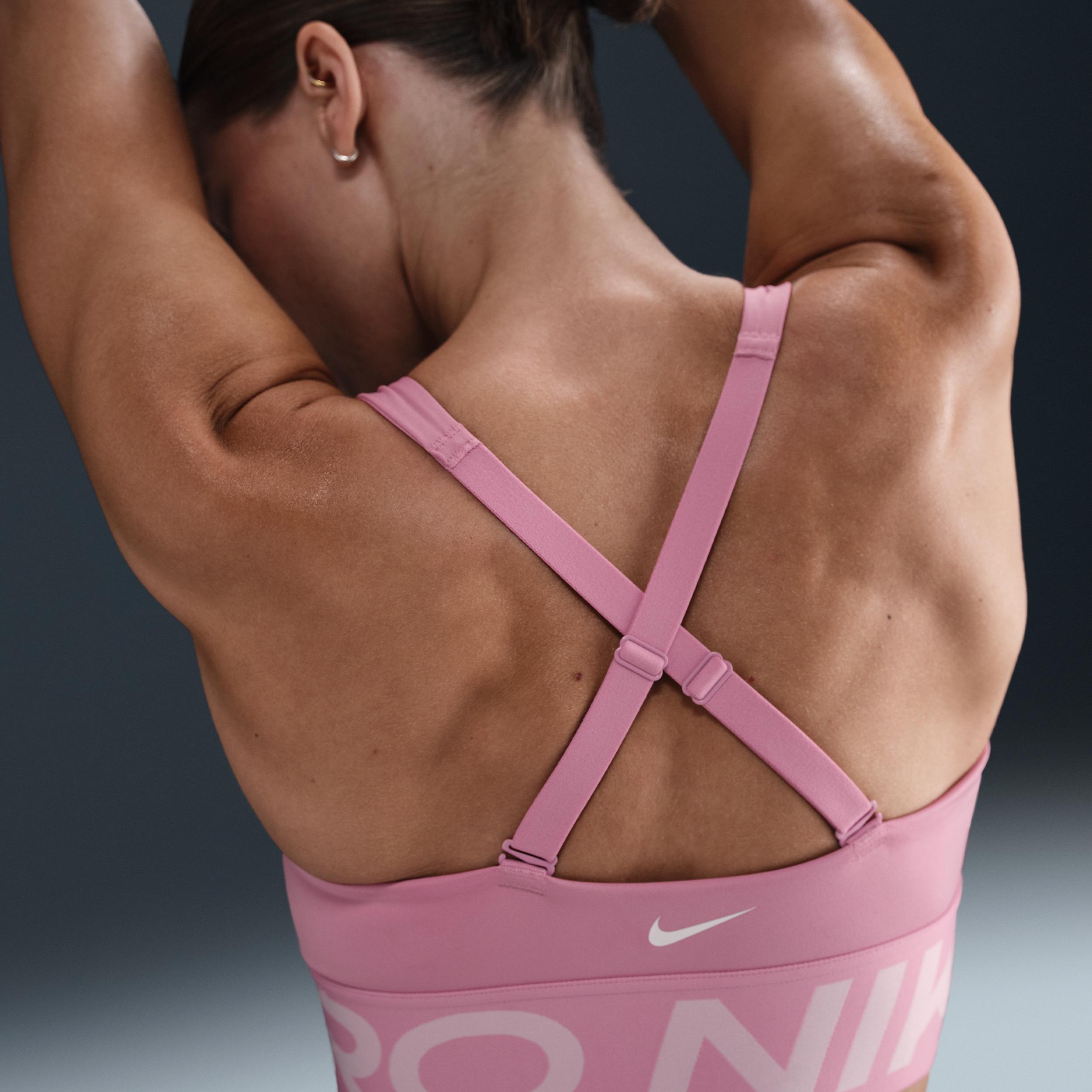 Nike Women's Pro Indy Plunge Sports Bra in Pink/Elemental Pink Size Medium Polyester/Spandex Product Image