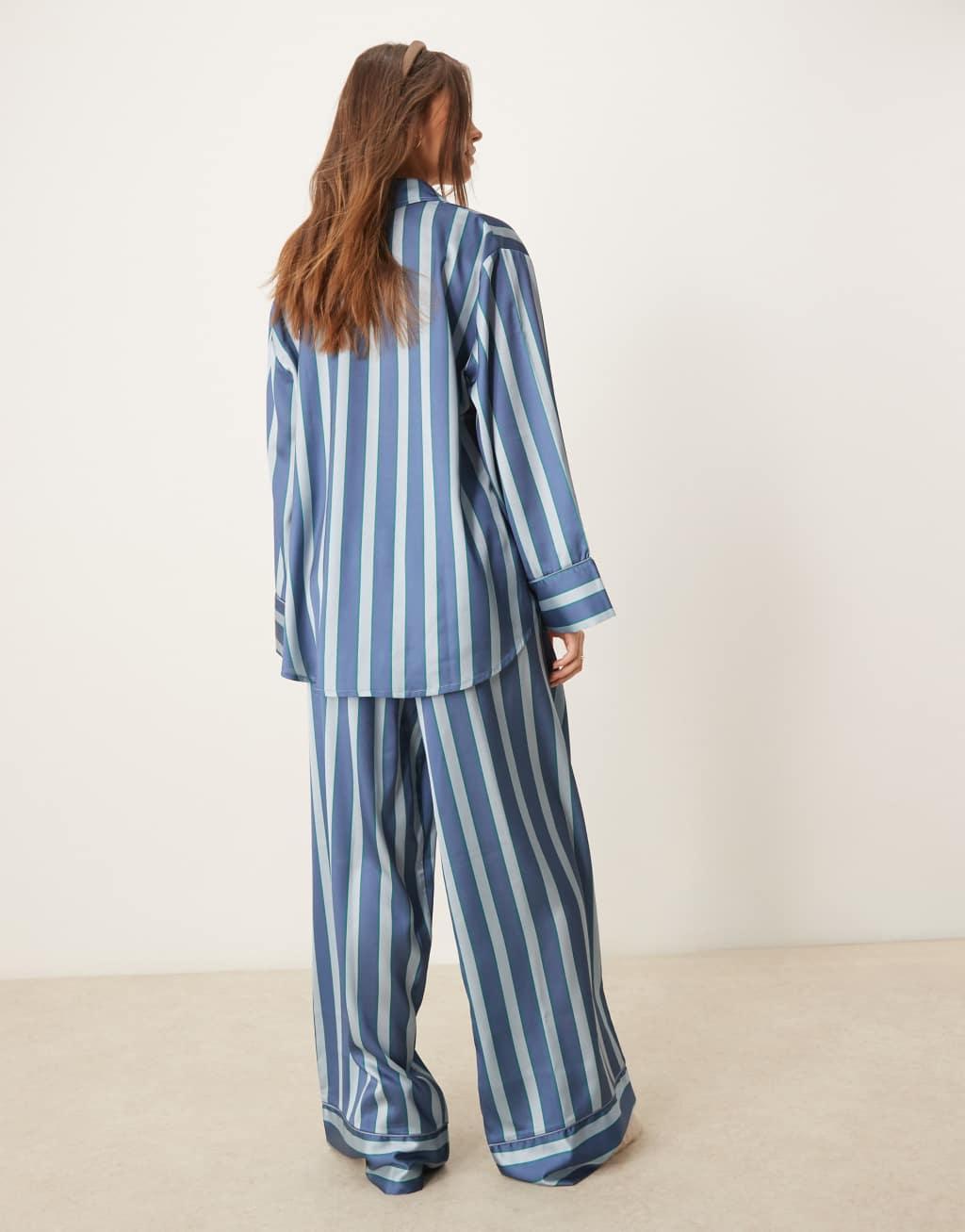 ASOS DESIGN oversized satin stripe shirt and pants pajama set in blue stripe Product Image