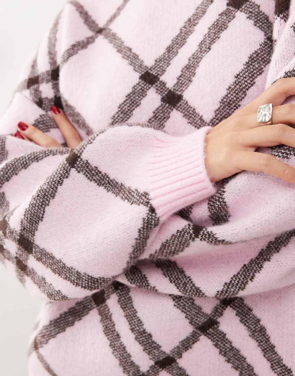 Monki oversized knit sweater in pink and black plaid Product Image