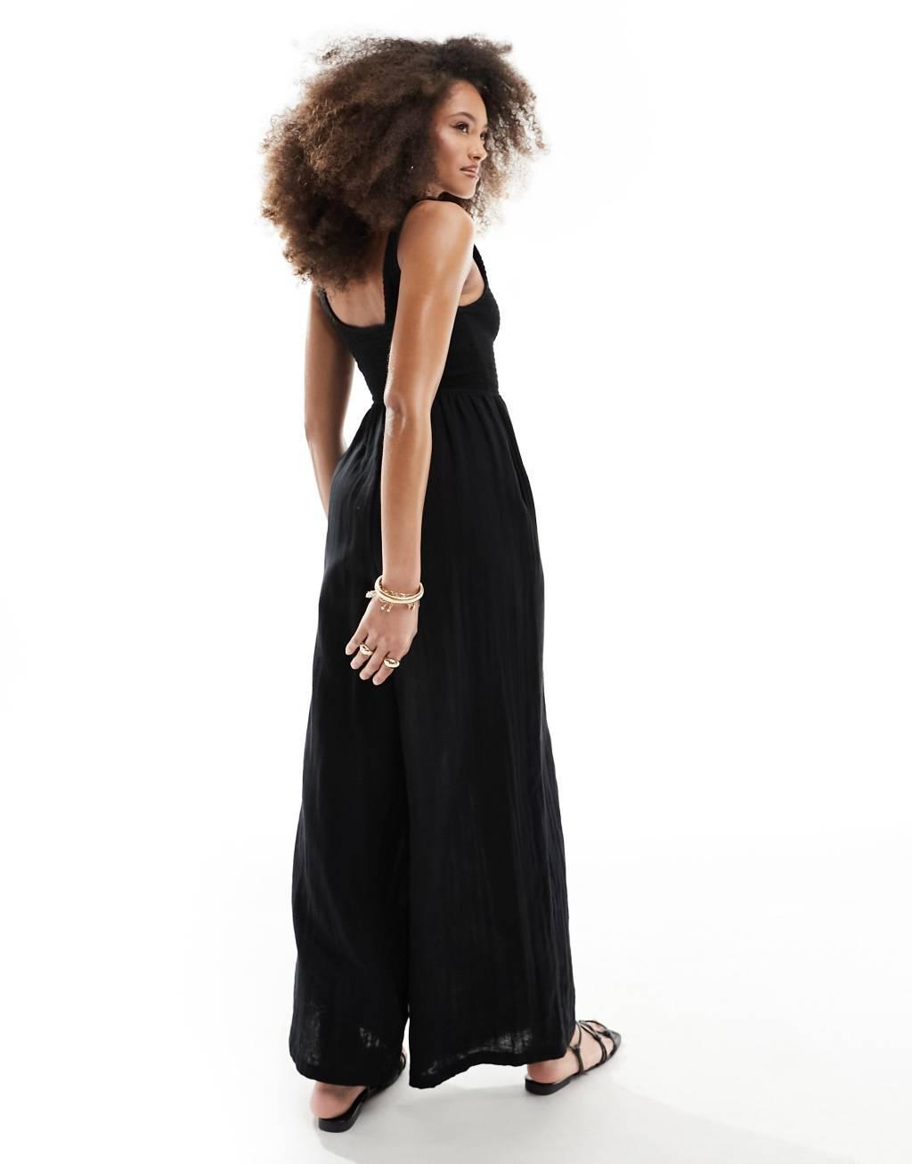 ASOS DESIGN scoop neck wide leg jumpsuit in black Product Image