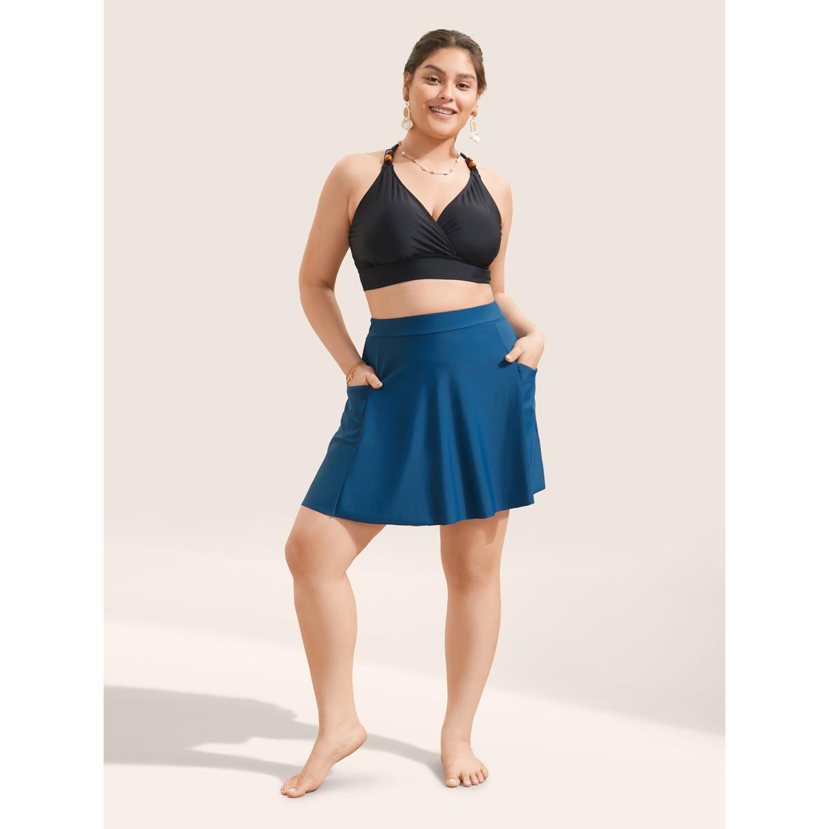 Plus Size Solid Patched Pocket Side Pleated Swim Skirt Women's Swimwear Indigo Beach Non High stretch Bodycon High Rise Slanted pocket Curve Swim Bottoms BloomChic 22-24/3X Product Image