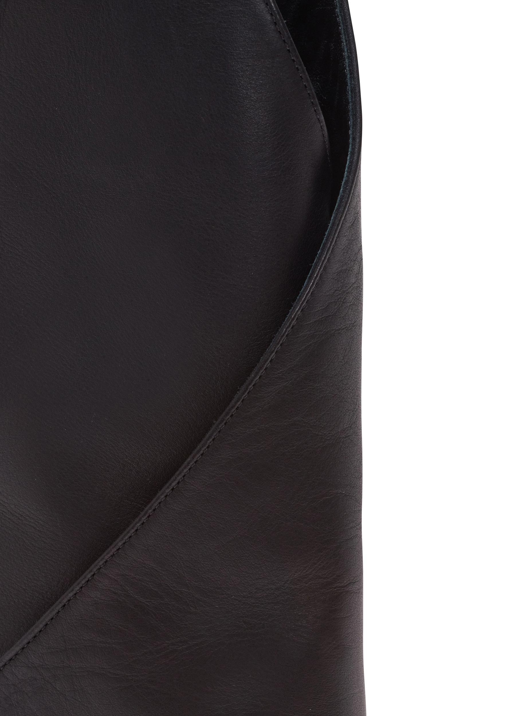 Twist heeled leather boots Product Image