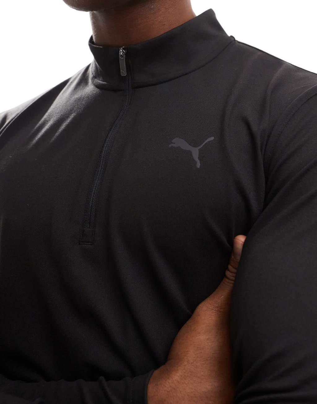 PUMA Training Slim Fit 1/4 Zip Sweater in black Product Image