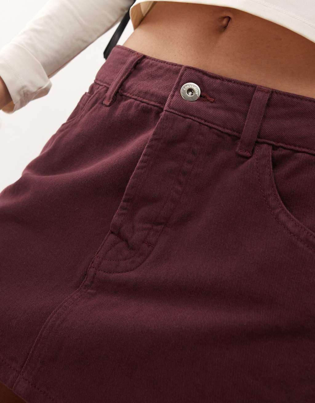 COLLUSION denim mini skirt in burgundy Product Image