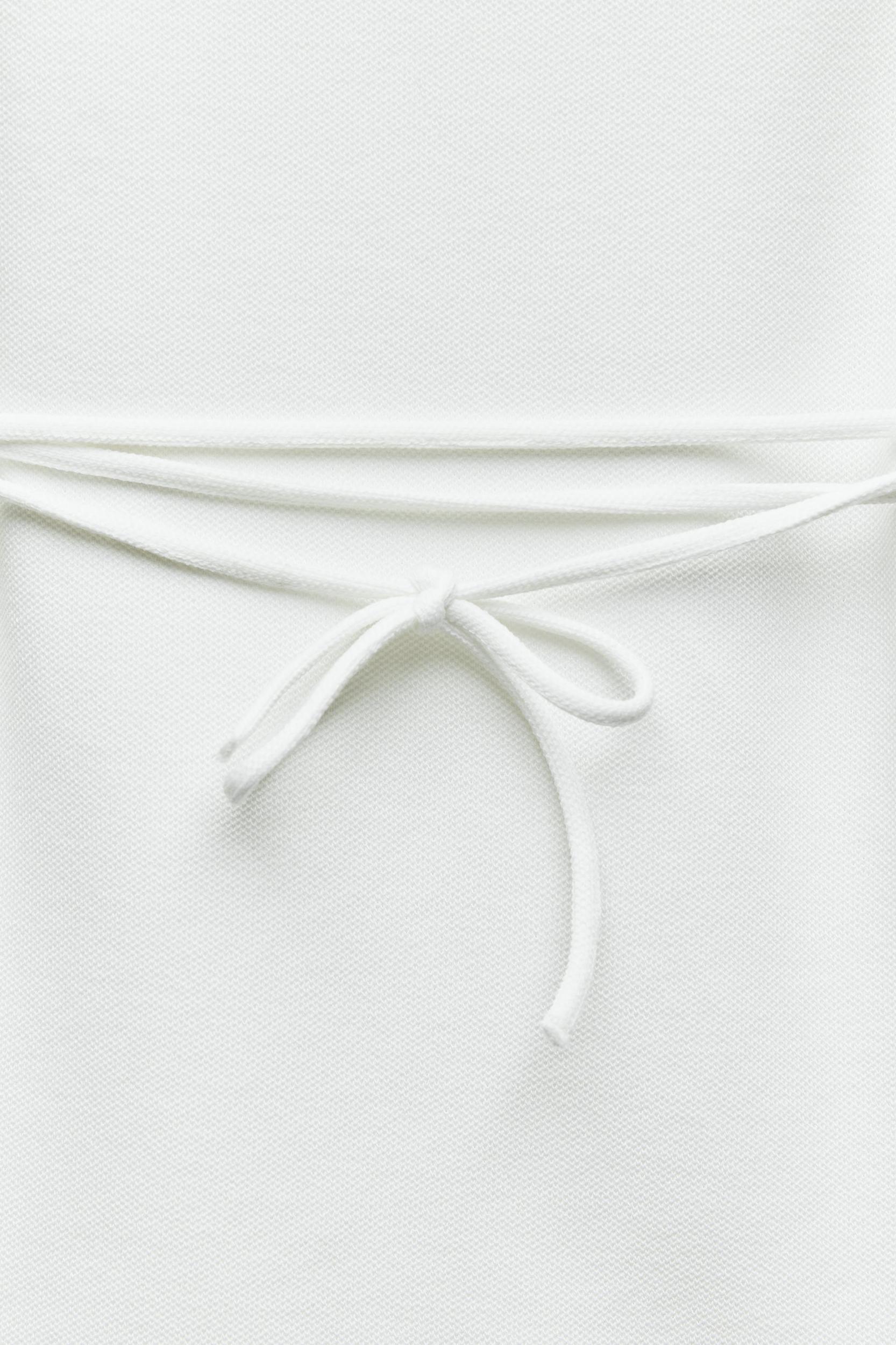 LONG BELTED SOFT PIQUÉ TOP Product Image
