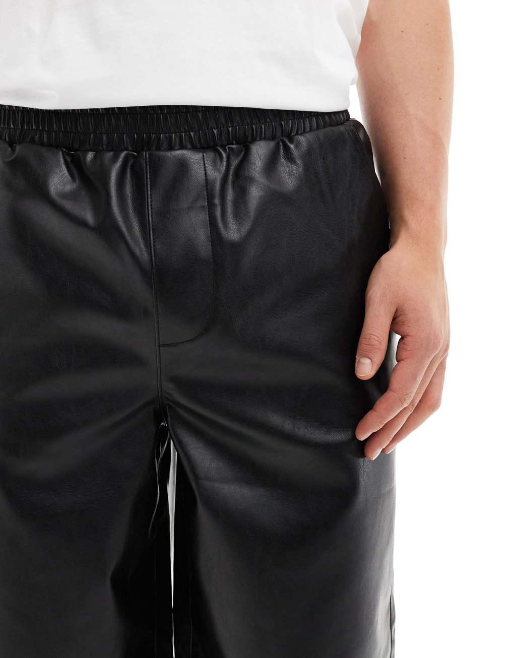 ASOS DESIGN leather look jorts in longer length in black Product Image
