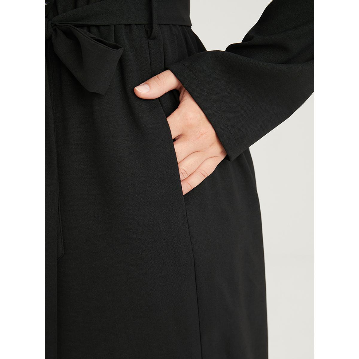 Plus Size Black Solid Embroidered Pocket Belted Jumpsuit Women Elegant Long Sleeve V-neck Dailywear Loose Jumpsuits BloomChic 28/5X Product Image