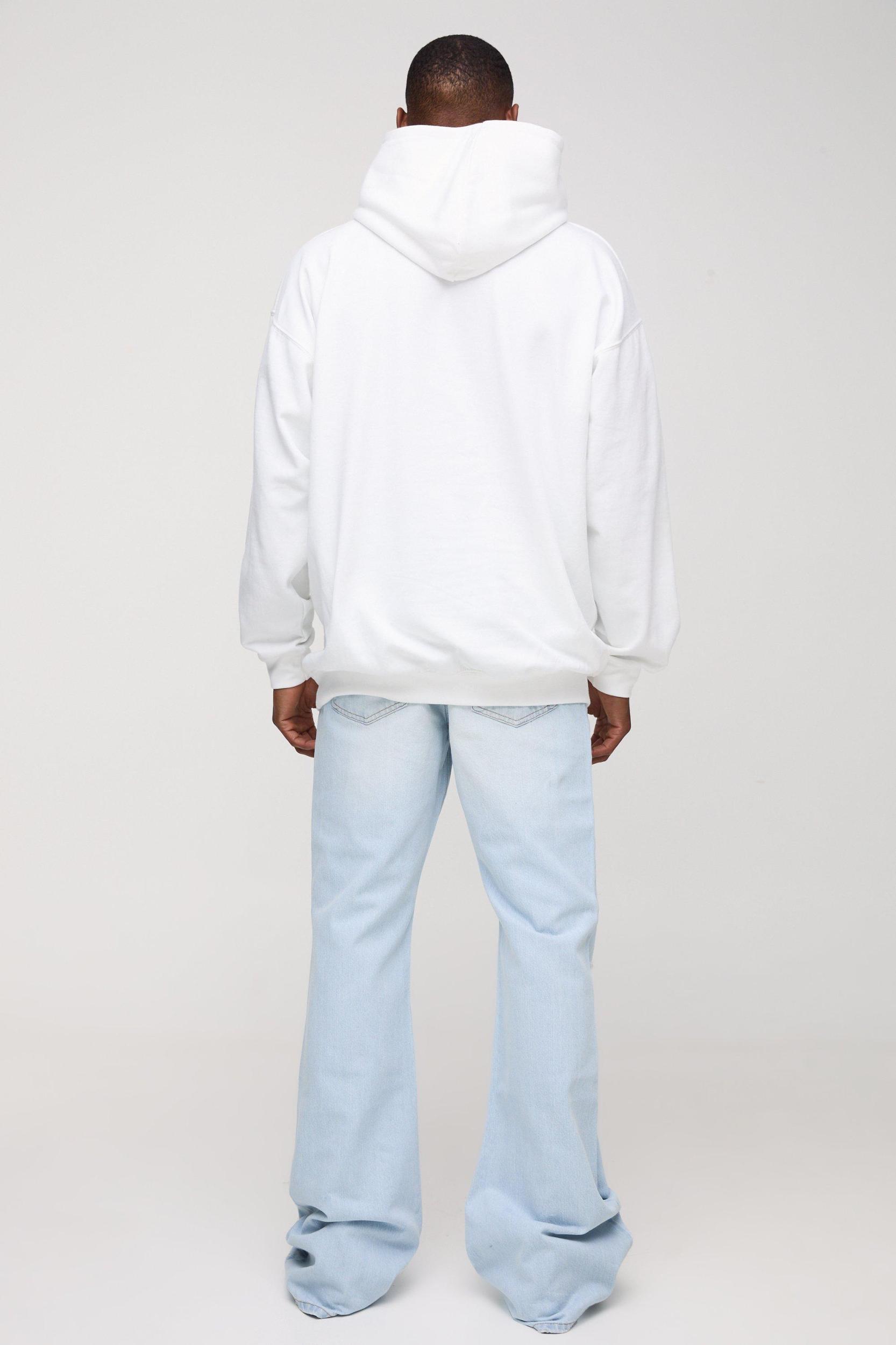 Relaxed Rigid Flare Stacked Knee Rip Denim Jeans | boohooMAN USA Product Image