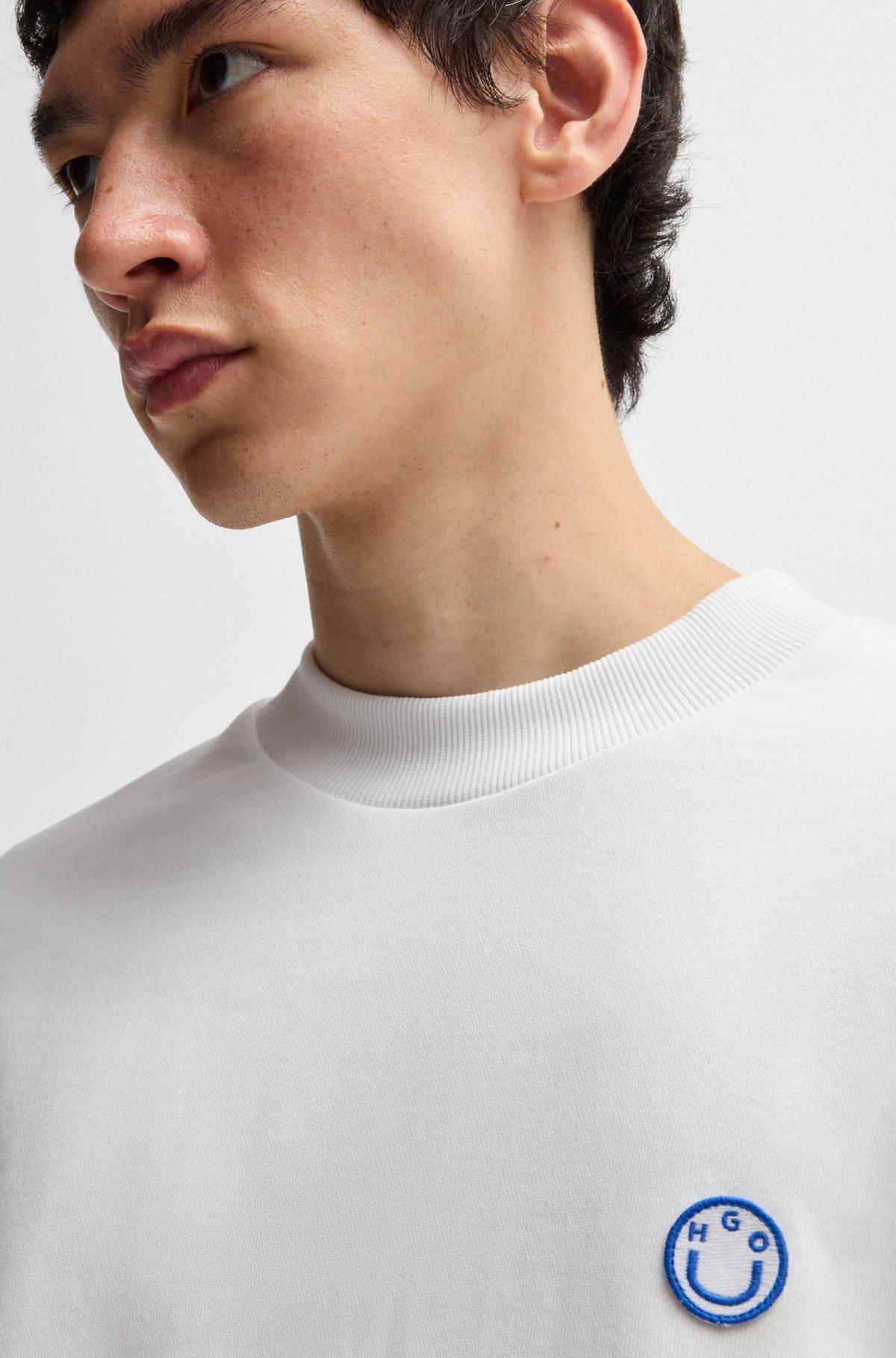 Cotton-terry sweatshirt with Happy HUGO logo Product Image