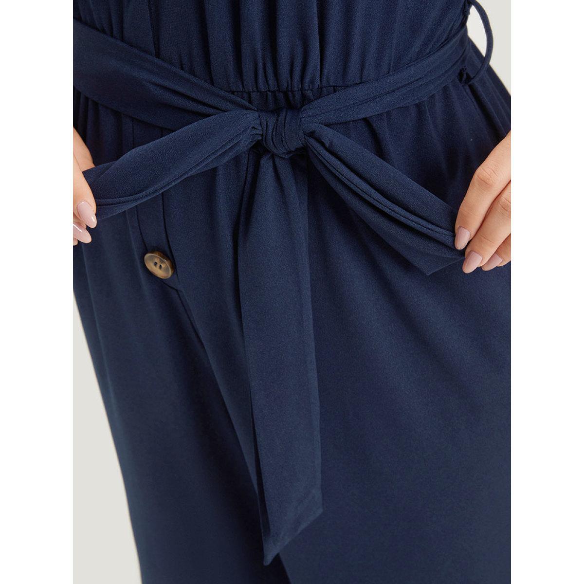 Plus Size DarkBlue Solid Button Up V Neck Belted Gathered Flutter Sleeve Jumpsuit Women Elegant Short sleeve V-neck Dailywear Loose Jumpsuits BloomChic 12/L Product Image