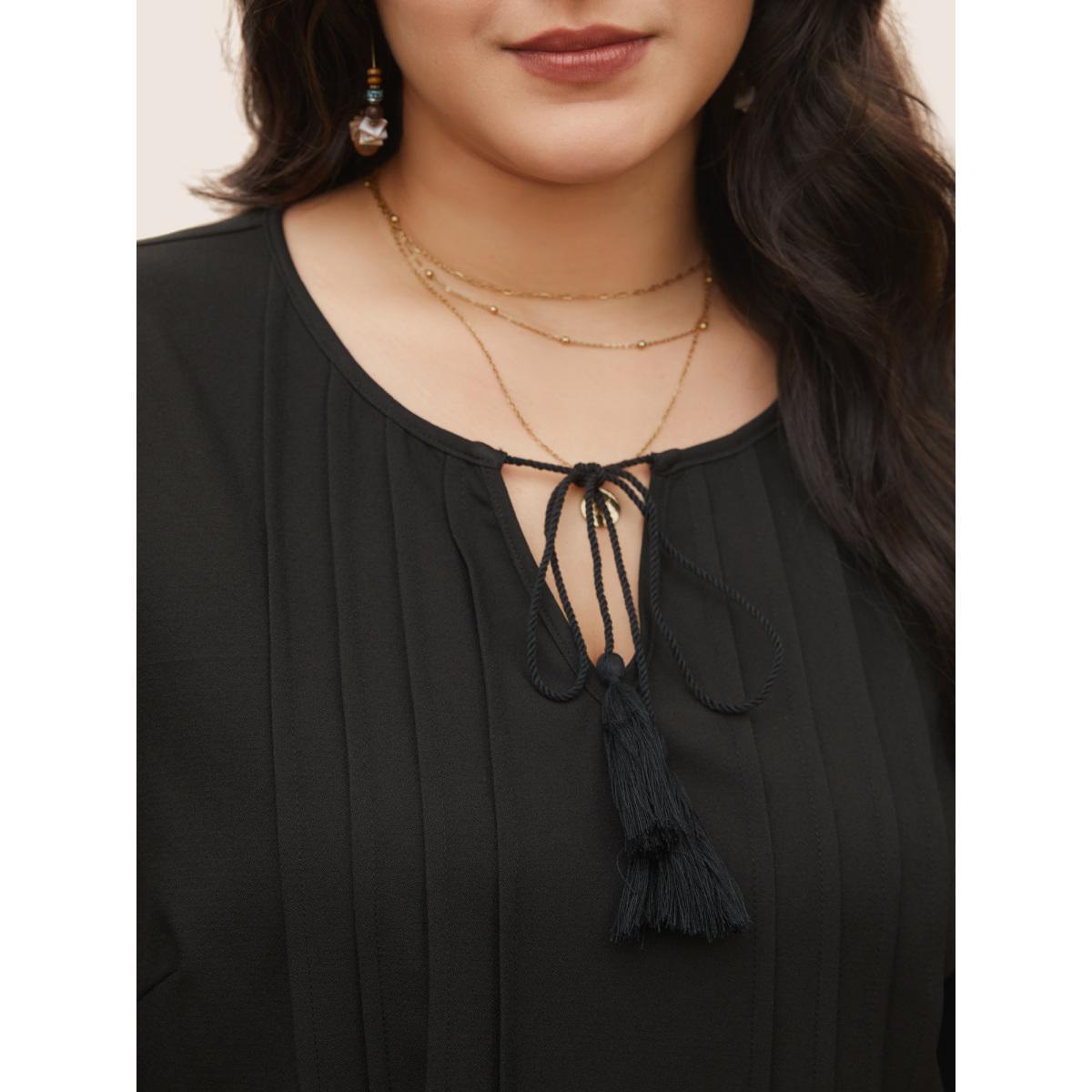 Plus Size Black Solid Laser Cut Pleated Tassel Trim Blouse Women Resort Half Sleeve V-neck Vacation Blouses BloomChic 28/5X Product Image