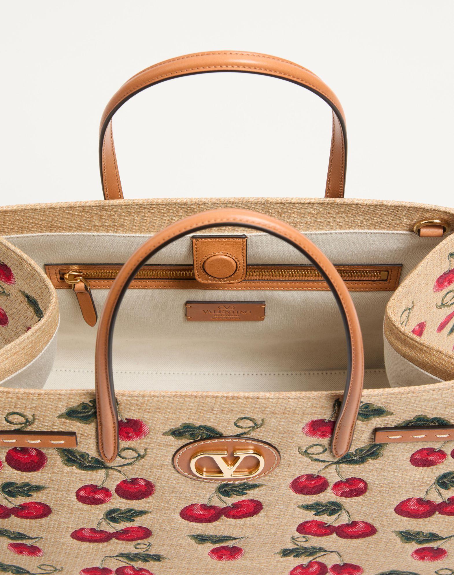 Valentino Garavani Antibes Medium Shopping Bag In Jacquard Raffia With Cherryfic Motif Product Image