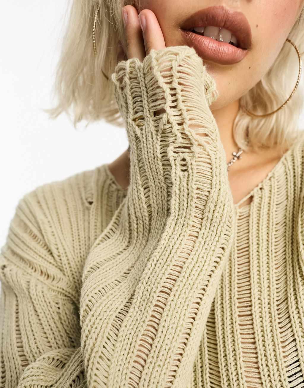 COLLUSION cropped distressed nibbled hem sweater Product Image