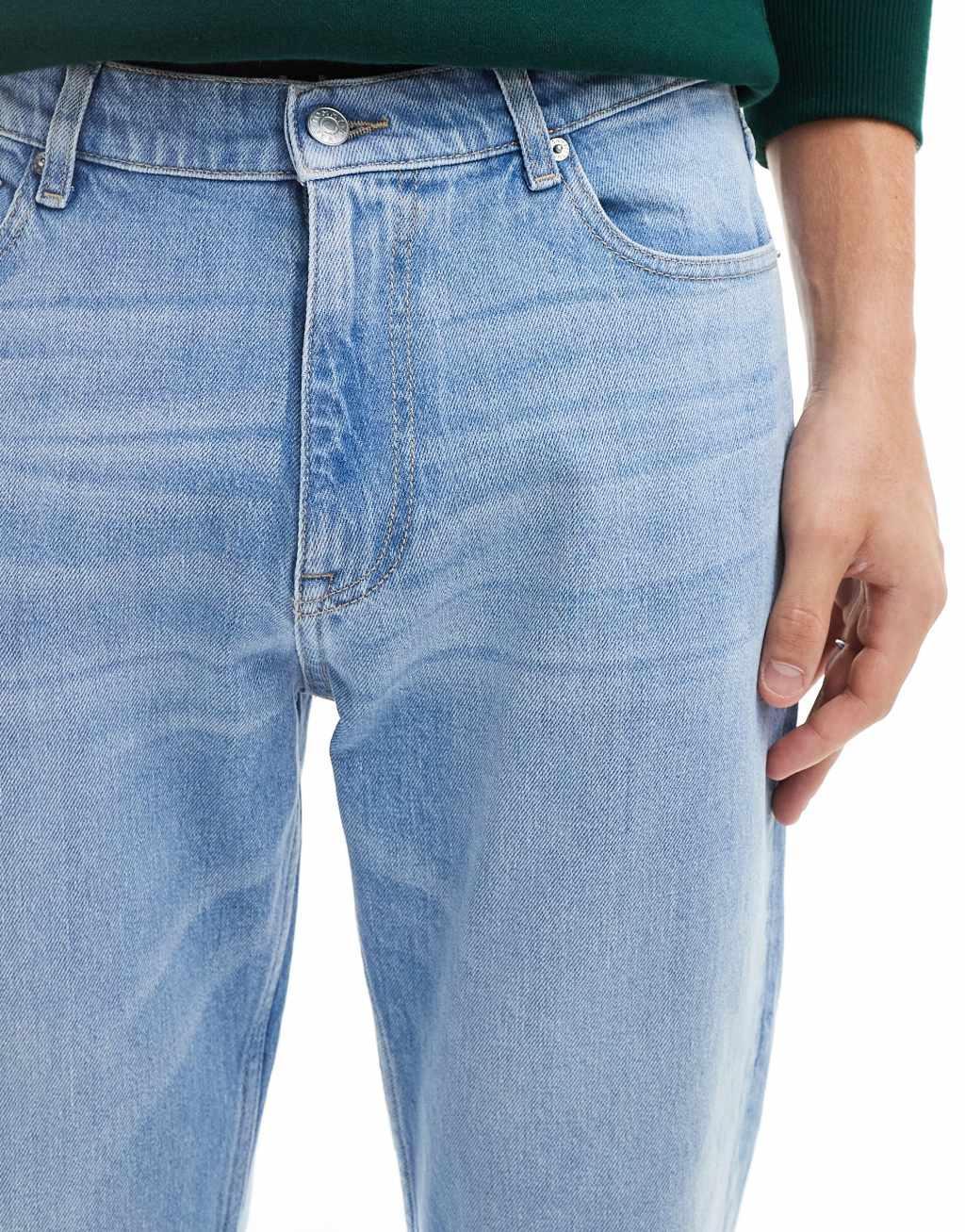 Tommy Jeans regular tapered dad jeans in mid wash Product Image