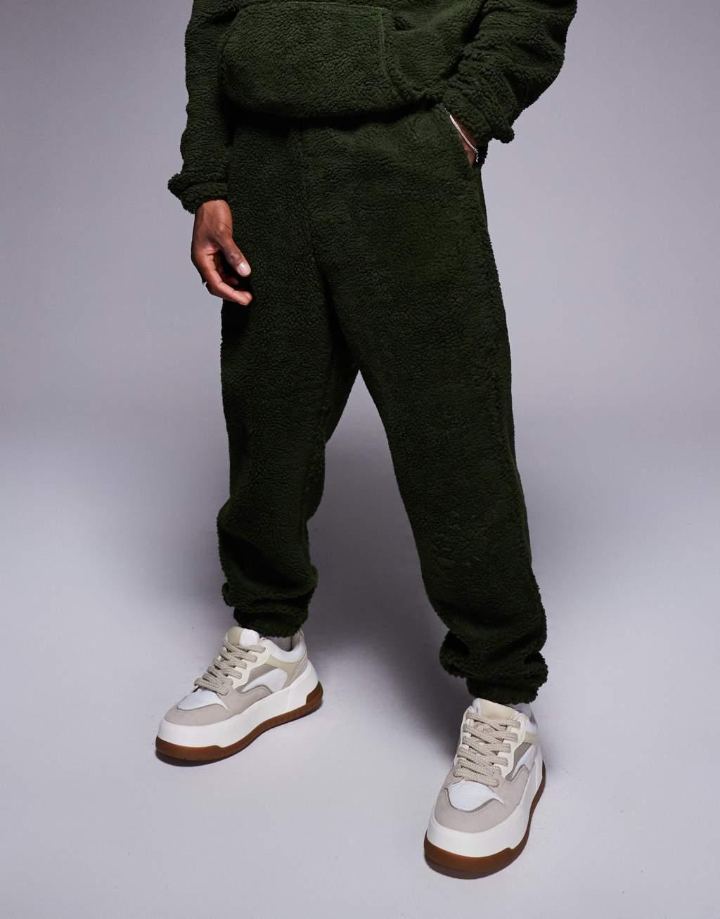 ASOS DESIGN oversized borg sweatpants in green Product Image