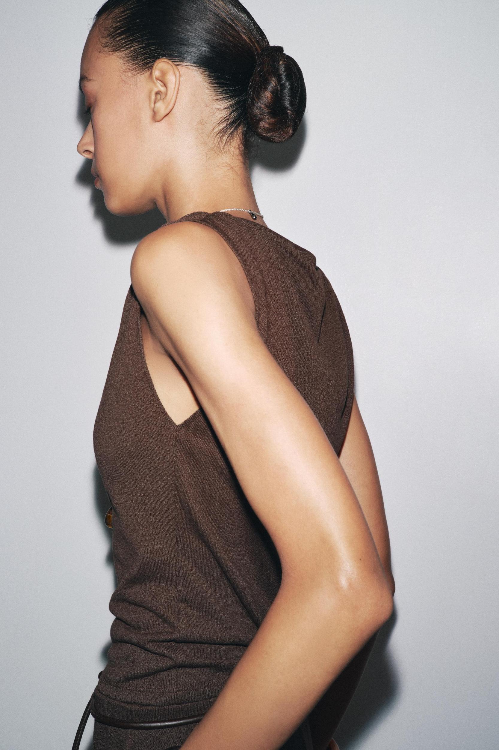 CUT-OUT KNIT TOP Product Image