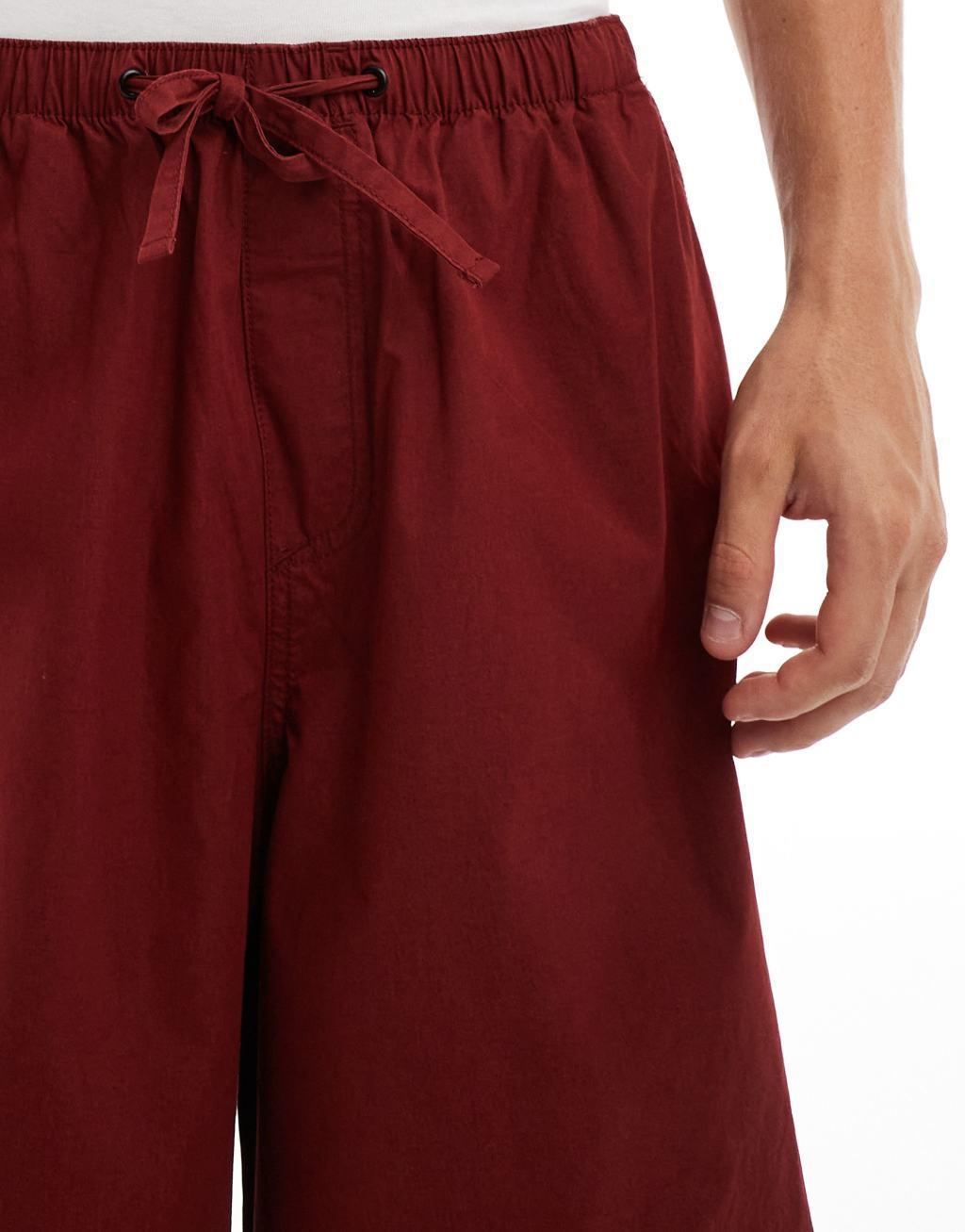 ASOS DESIGN baggy balloon parachute pant in burgundy Product Image