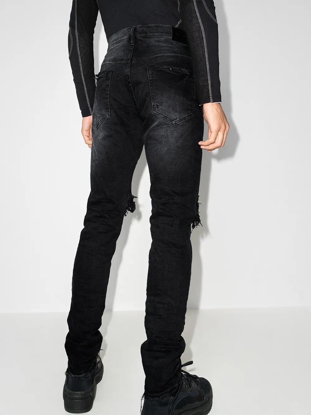 low-rise "Black Wash Blowout" slim jeans Product Image