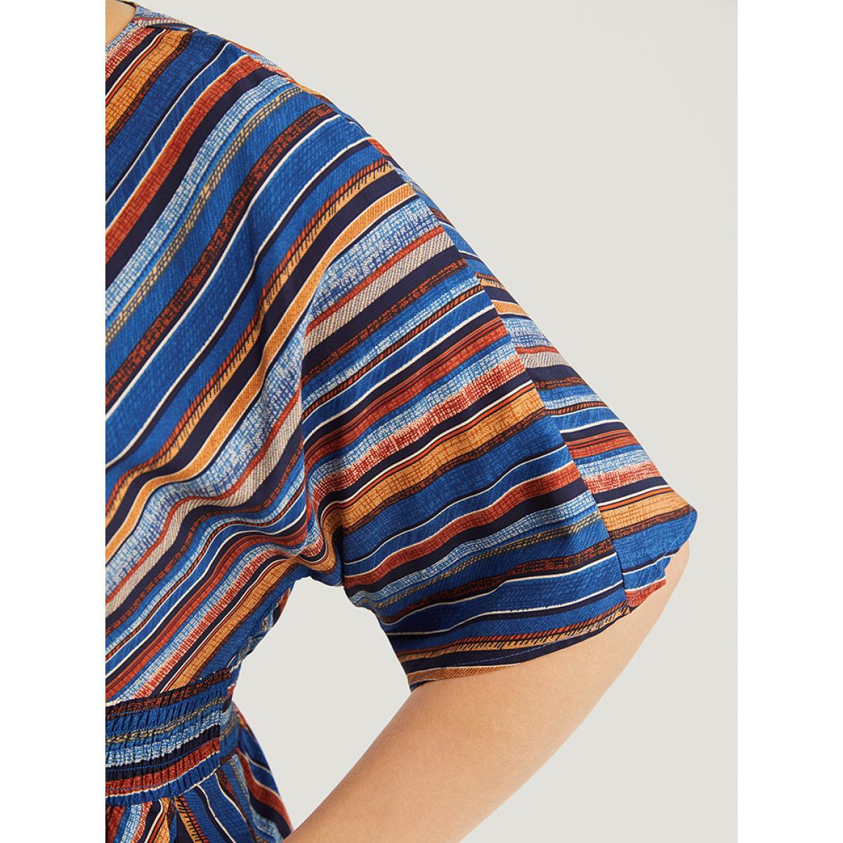 Plus Size Navy Striped Contrast Shirred Wrap High Low Hem Pocket Blouse Women Vacation Short sleeve V-neck Vacation Blouses BloomChic 18-20/2X Product Image