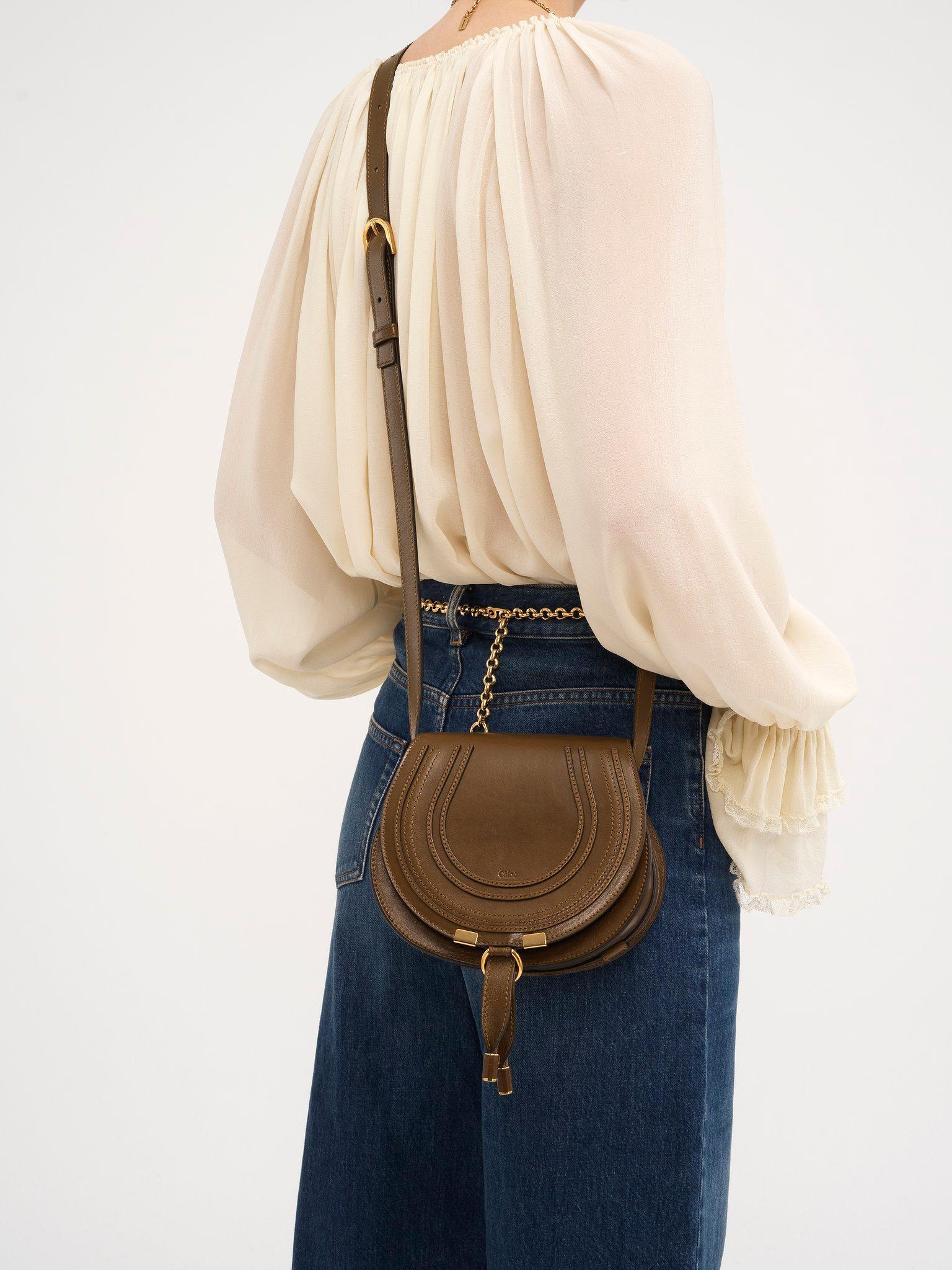 Small Marcie saddle bag in shiny leather Product Image