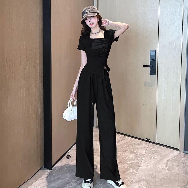 Set: Short-Sleeve Asymmetrical Neck Ruched Slit Slim Fit T-Shirt + Drawstring Waist Loose Fit Sweatpants Product Image